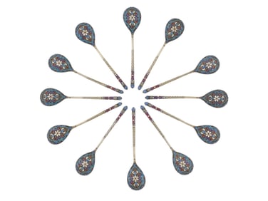 A LOT OF TWELVE RUSSIAN SILVER AND CLOISONNE ENAMEL SPOONS