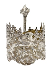 A RUSSIAN SILVER TEA GLASS HOLDER (PODSTAKANNIK) WITH FIGURAL DECORATION, CIRCA 1890–1908