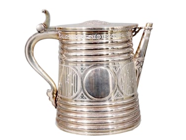 A LARGE RUSSIAN GILT-SILVER LIDDED TANKARD BY SAZIKOV, 1872
