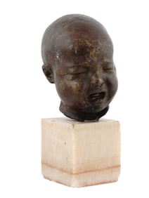 AN UNUSUAL CAST-BRONZE CHILD HEAD, ITALY, CA. 19TH CEN.