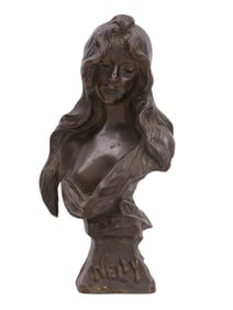 A BRONZE BUST BY E. VILLANES TITLED "NELLY"