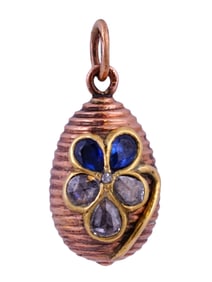 A RUSSIAN GOLD-MOUNTED MINIATURE EASTER EGG, 19TH CEN.