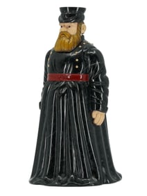 A RUSSIAN CARVED HARDSTONE AND GOLD FIGURE OF A STANDING GORODOVOI, 20TH CENTURY