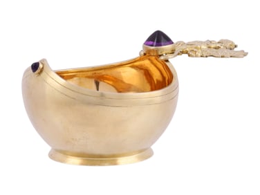 A RUSSIAN FABERGE GILT-SILVER KOVSH WITH IMPERIAL EAGLE HANDLE AND CABOCHON