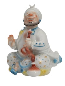 A MEISSEN PORCELAIN FIGURE OF A SEATED ORIENTAL MUSICIAN, GERMANY, 20TH CENTURY