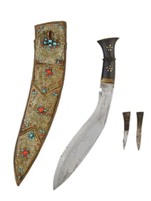 A NEPALESE KUKRI KNIFE IN AN ORNATE SHEATH WITH TWO SMALL KNIVES