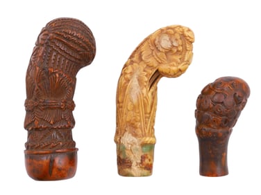 A LOT OF THREE CARVED KRIS DAGGER HANDLES, MALAYSIA, 19TH CENTURY