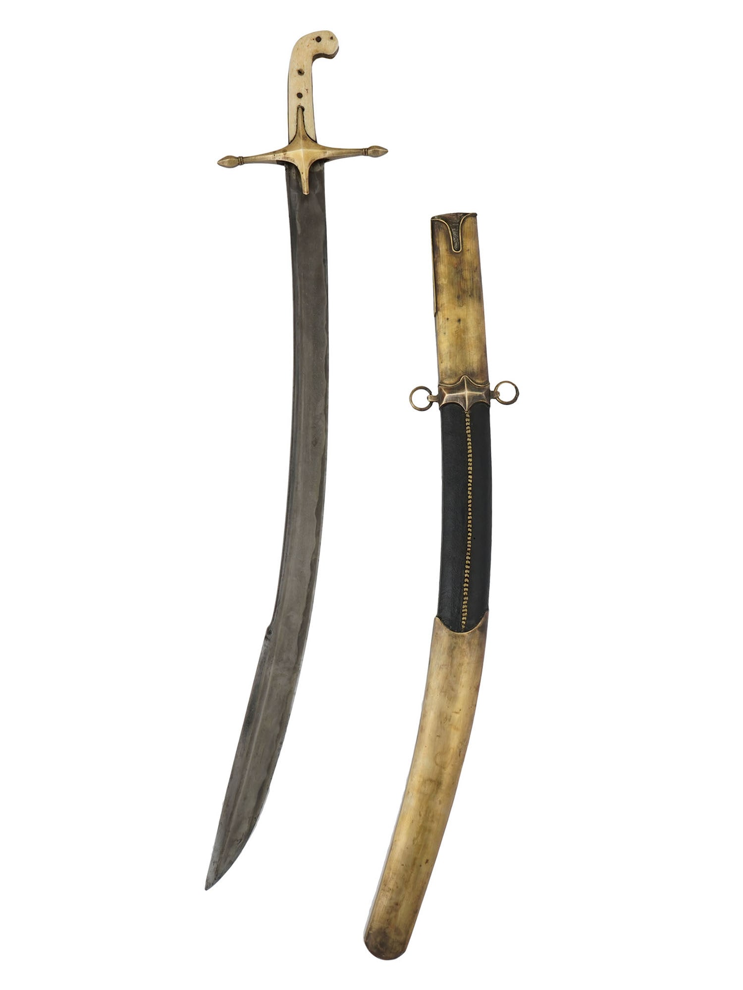 AN OTTOMAN EMPIRE PALA OR KLIJ SWORD WITH A WOOTZ BLADE, 19TH CEN.: Oriental Pala sword with brass mounts. A four-pointed star-shaped hilt formed by the crossguard and the two quillons ending in faceted terminals and riveted marine bone plates. Pala-type blade in Dama