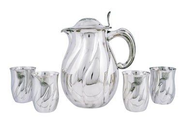 A RARE NAZI GERMAN SILVER SET OF FOUR HERMANN GÖRING COAT OF ARMS GOBLETS AND A PITCHER, CIRCA