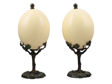 A PAIR OF OSTRICH EGGS ON VIENNA COLD-PAINTED BRONZE STANDS, BY ANTONY REDMILE, C.1900
