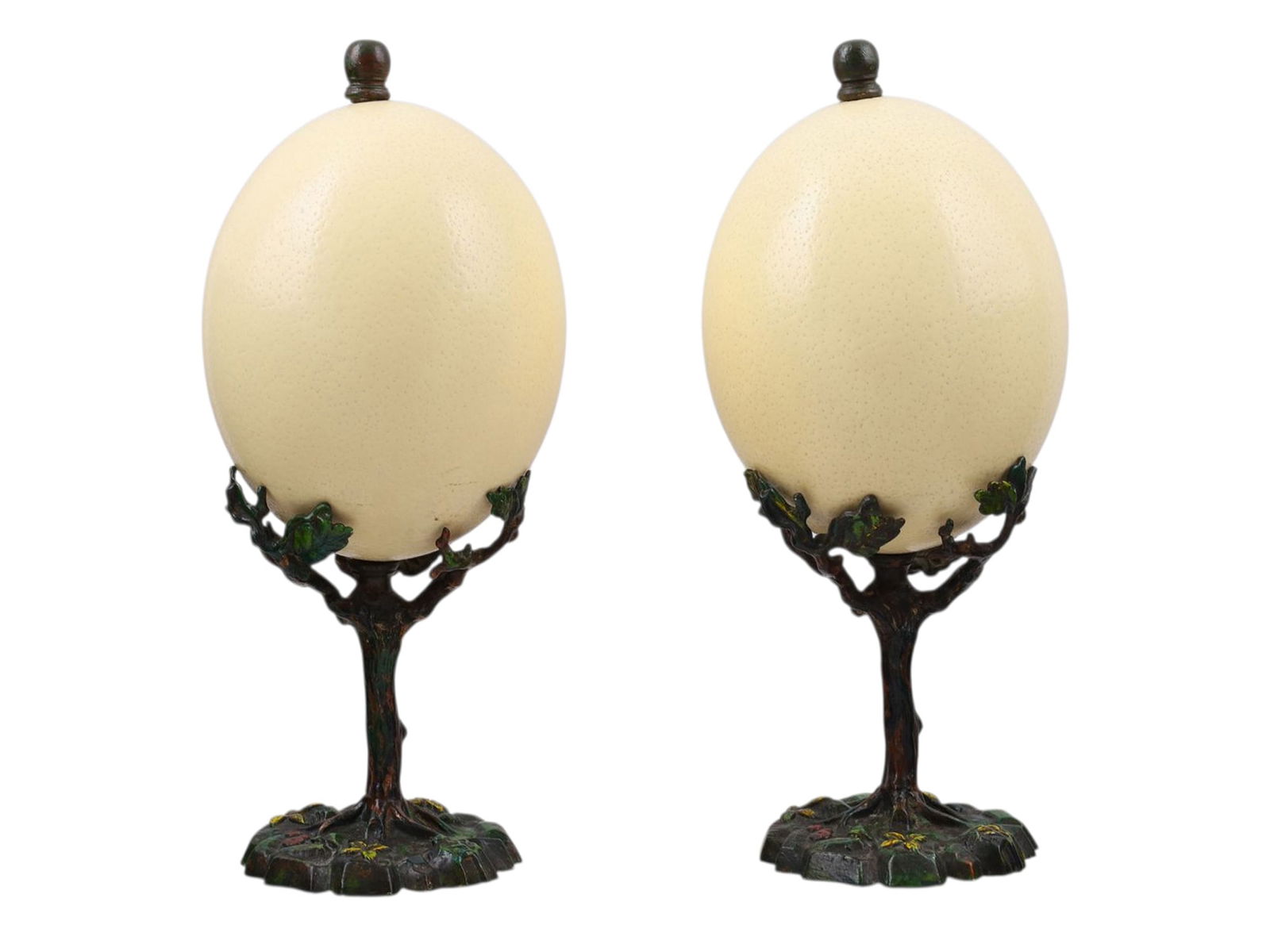 A PAIR OF OSTRICH EGGS ON VIENNA COLD-PAINTED BRONZE STANDS, BY ANTONY REDMILE, C.1900