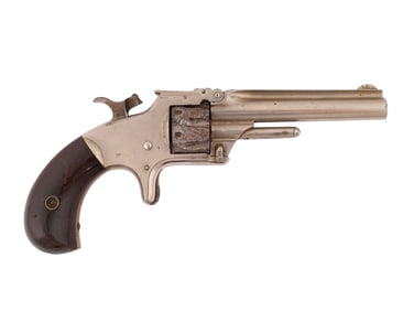 A SMITH & WESSON MODEL 1 ½, SECOND ISSUE NICKEL-PLATED POCKET REVOLVER, CIRCA 1868–1875