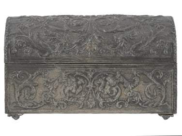 A CONTINENTAL EMBOSSED METAL CASKET WITH TEXTILE LINING, 19TH CENTURY