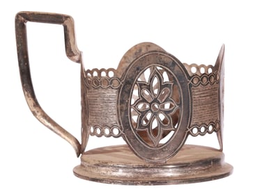 A RUSSIAN ENGRAVED SILVER TEA GLASS HOLDER