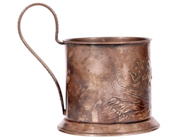 A SOVIET SILVER-ALLOY TEA GLASS HOLDER WITH TROIKA
