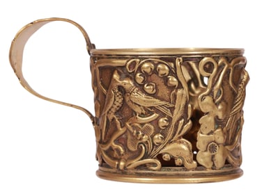 A POLISH BRASS TEA GLASS HOLDER, 19-20 CC.