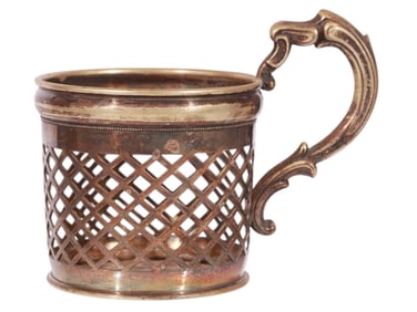 A POLISH SILVER-PLATED TEAGLASS HOLDER BY FRAGET, 19/20 CC.