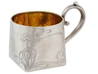 A PARCEL-GILT RUSSIAN SILVER TEA GLASS HOLDER, CIRCA 1900