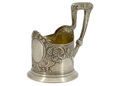 A RUSSIAN ART NOUVEAU PARCEL-GILT SILVER GLASSHOLDER, 2ND MOSCOW ARTEL