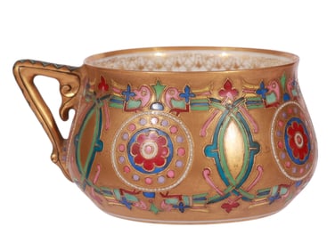 A GILT AND ENAMEL-PAINTED KUZNETSOV PORCELAIN TEA CUP, 19 C.