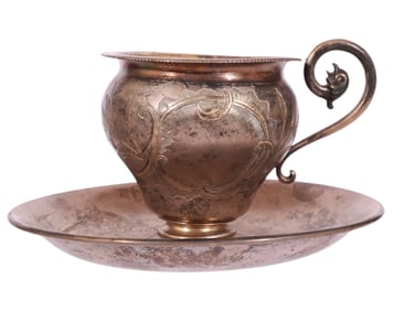 A RUSSIAN PARCEL GILT-SILVER CUP AND SAUCER, 19TH CEN.