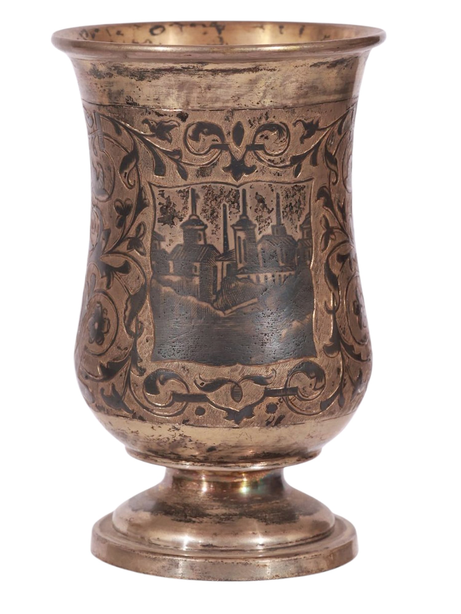 A RUSSIAN PARCEL-GILT SILVER AND NIELLO BEAKER WITH CITY VIEW, 1857: A finely crafted silver beaker decorated across its entire surface with beautiful niello foliate scrollwork surrounding a depiction of a Russian city skyline. Hallmarks: 'AR' cyrillic maker's mark, Il