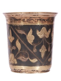 A RUSSIAN GILT-SILVER AND NIELLO BEAKER WITH FLORAL PATTERNS, 1840