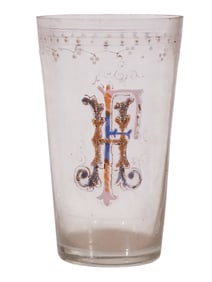 A RUSSIAN GLASS BEAKER WITH ENAMEL PAINTED INITIALS