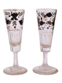 A PAIR OF RUSSIAN HAND-PAINTED AND GILT CHAMPAGNE GLASSES