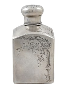 A RUSSIAN ENGRAVED SILVER TEA CADDY WITH FLORAL MOTIFS, 19TH CENTURY