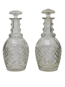 TWO ENGLISH CUT-CRYSTAL ENGLISH LIDDED DECANTERS, 19TH CENTURY