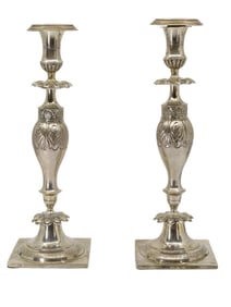 A PAIR OF RUSSIAN SILVER CANDLE HOLDERS, 1867