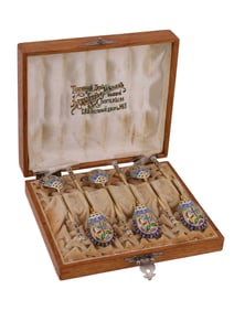 A CASED SET OF SIX RUSSIAN GILT SILVER AND CLOISONNÉ ENAMEL SPOONS