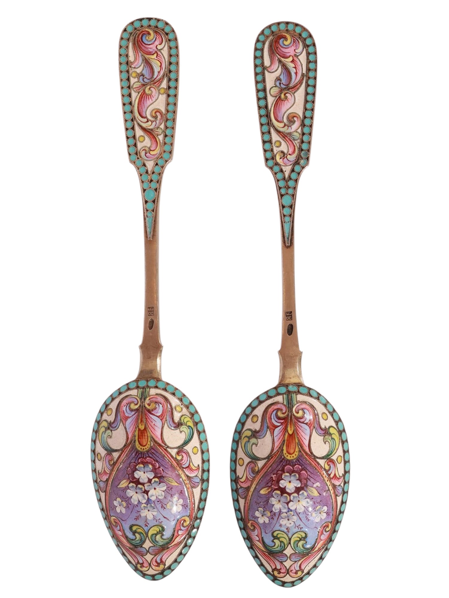 A PAIR OF RUSSIAN PARCEL-GILT SILVER AND CLOISONNE ENAMEL SPOONS: A lot of two Russian late 19th ce Dimensions: L: 7 in., (17.8 cm.) Please make all inquiries before bidding. All lots are sold "as-is", refer to our T&C. Helios Auctions offers in-house shipping. In c