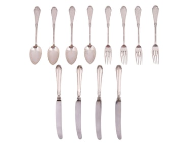 A FABERGÉ, RUSSIAN SILVER TWELVE-PIECE FLATWARE SET, 19TH–EARLY 20TH CENTURY