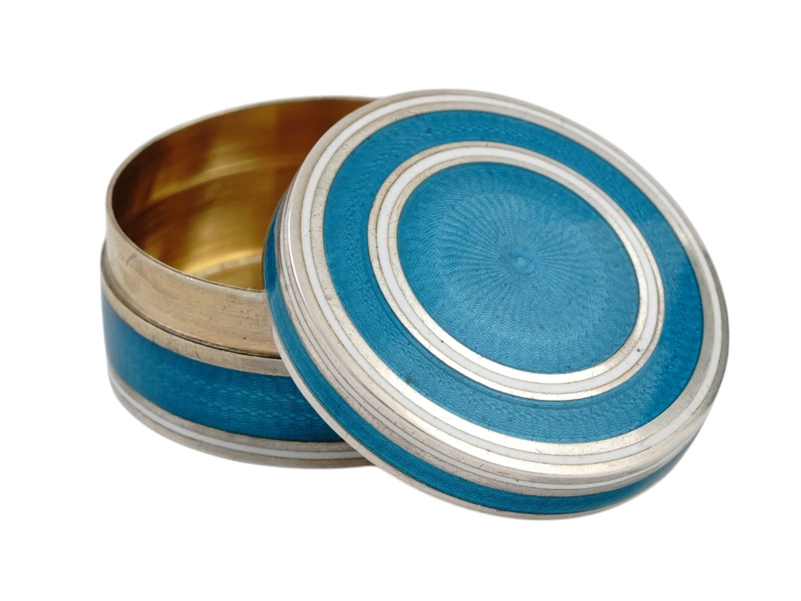 A KHLEBNIKOV SILVER AND GUILLOCHE ENAMEL PILL BOX, RUSSIA, 19 C.: A circular Russian silver pill box of white and blue guilloche enamel along the top and side of the box. Silver hallmarks on the underside of the top and box. Silver Hallmarks: Russian 84 Kokoshnik si