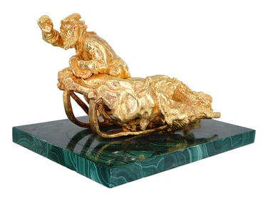 A RUSSIAN GILT BRONZE AND MALACHITE FIGURAL GROUP