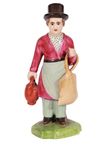 A RUSSIAN PORCELAIN FIGURE OF A STREET VENDOR, POPOV FACTORY, MOSCOW REGION, CIRCA 1830–1850