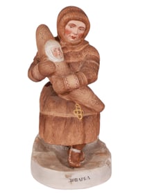 AN EARLY SOVIET VERBILKI BISQUE PORCELAIN FIGURE OF A LOPAR WOMAN WITH CHILD