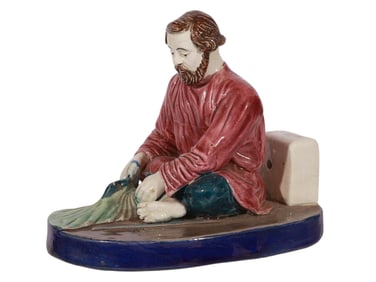 A HAND-PAINTED RUSSIAN PORCELAIN PRIVATE FACTORY FIGURE OF A PEASANT MAN