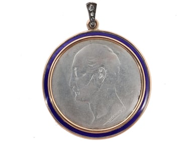 A RUSSIAN SILVER GOLD-MOUNTED NICHOLAS I PENDANT, C. 1859