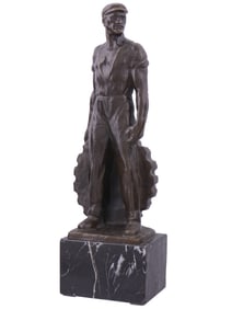 A BRONZE FIGURE OF A WORKER BY ERNST SEGER, GERMAN, CA. 1930