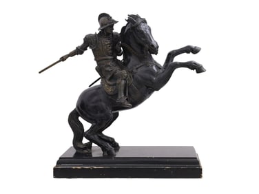 A BRONZE SCULPTURE 'IL CAVALLO' OF A KNIGHT ON HORSEBACK