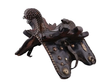 AN OTTOMAN OR BERBER NOBLEMAN'S SADDLE WITH BRASS STUDS, 19TH CENTURY