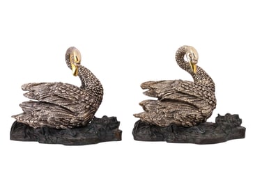 A PAIR OF LIMITED EDITION BRONZE SWANS WITH SILVERED AND GILT DETAILS, 20TH CENTURY