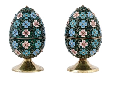 TWO SOVIET RUSSIAN GILT SILVER AND CLOISONNÉ ENAMEL EASTER EGGS ON STANDS