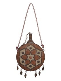A NORTH AFRICAN WATER CANTEEN WITH DECORATED OVERLAY, 19TH CENTURY