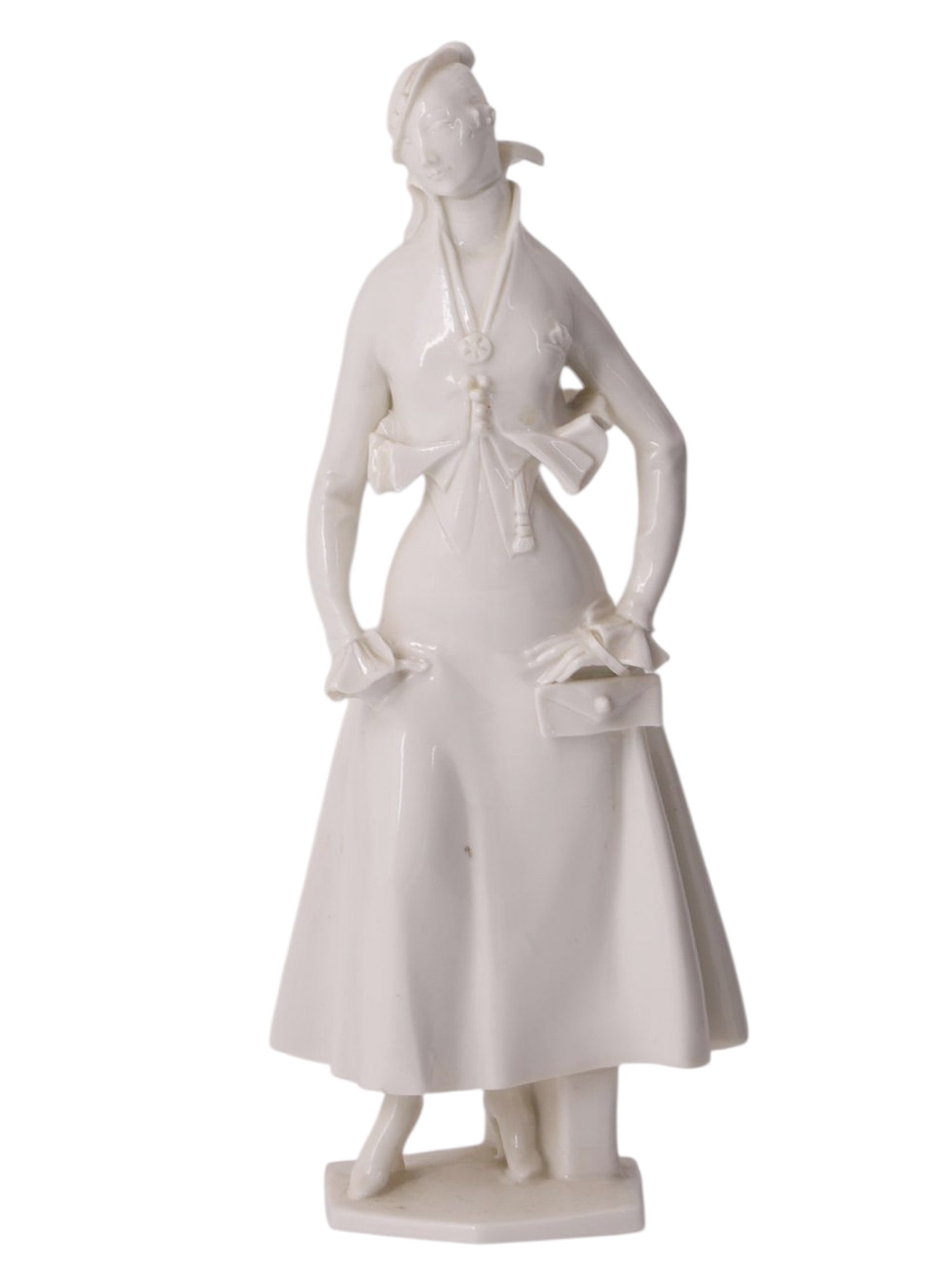 A GERMAN ART DECO WHITE PORCELAIN FIGURE OF A MODERN LADY BY PAUL SCHEURICH, CIRCA 1930 (1 of 6)