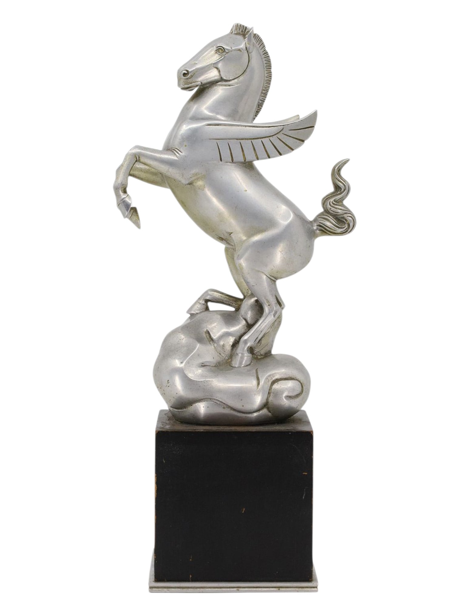 A WIENER WERKSTATTE HAGENAUER ART DECO PEGASUS SCULPTURE, VIENNA, CIRCA 1925–1935: A sculptural Art Deco figure of Pegasus shown rearing upon stylized clouds, modeled in a highly streamlined and modernist idiom characteristic of the Wiener Werkstatte Hagenauer workshop. The Pegasus