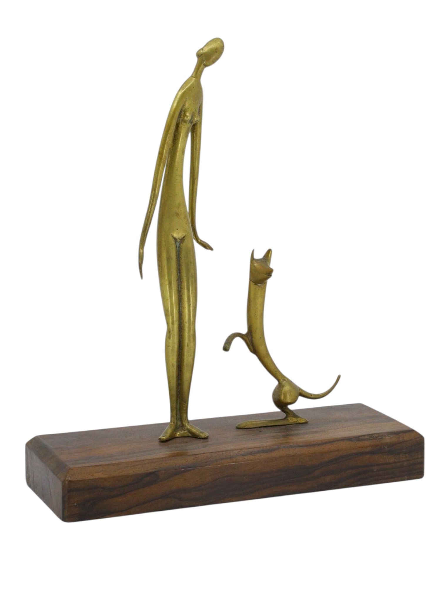 A BRONZE FIGURAL GROUP OF A WOMAN AND A CAT, CONTINENTAL EUROPEAN SCHOOL, MID 20TH CENTURY: Cast in bronze and composed as a slender, elongated female figure standing beside a stylized cat, the woman depicted upright with gently inclined head and attenuated limbs, rendered with a reductive m